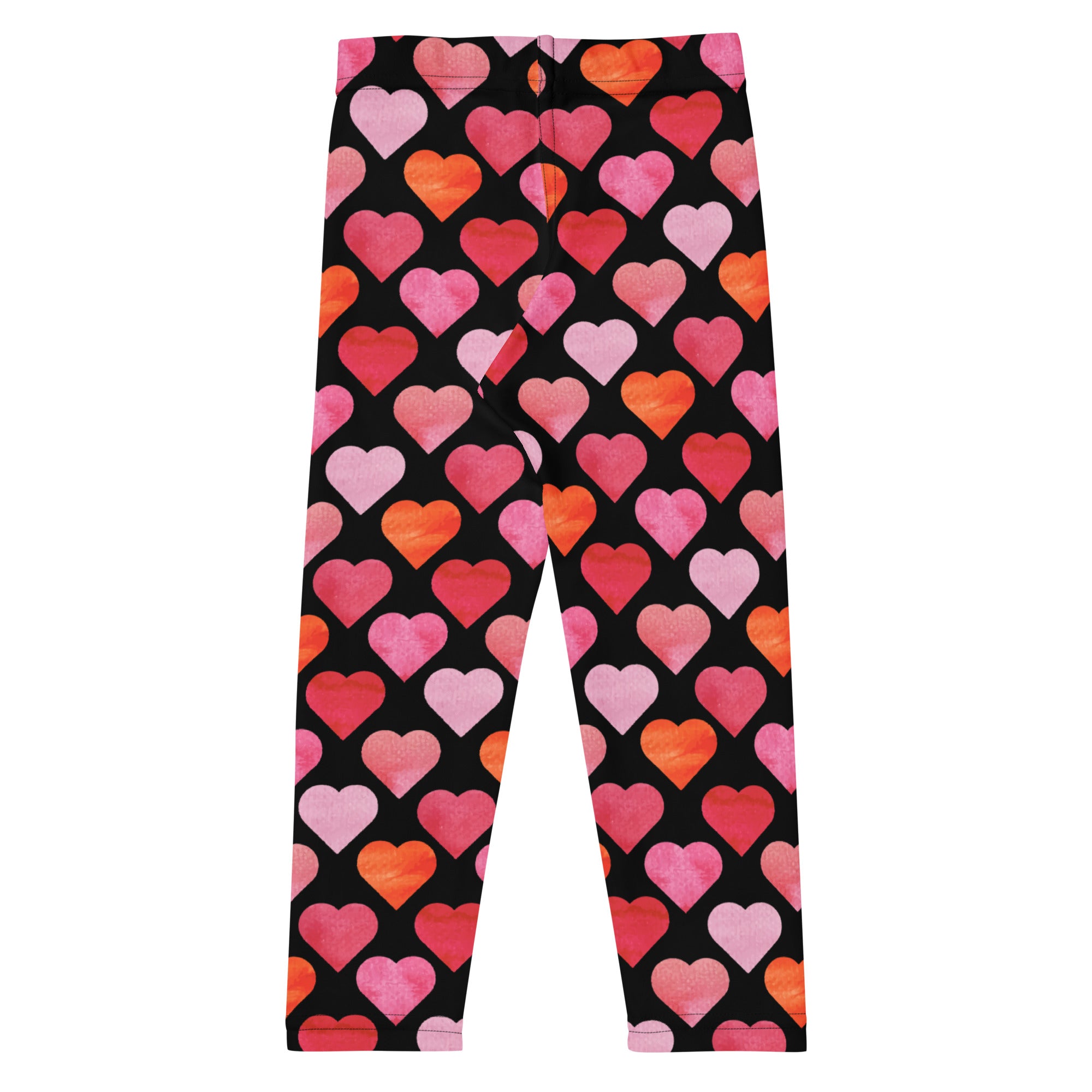 Girls black heart buttery soft leggings featuring vibrant pink and orange watercolor heart patterns