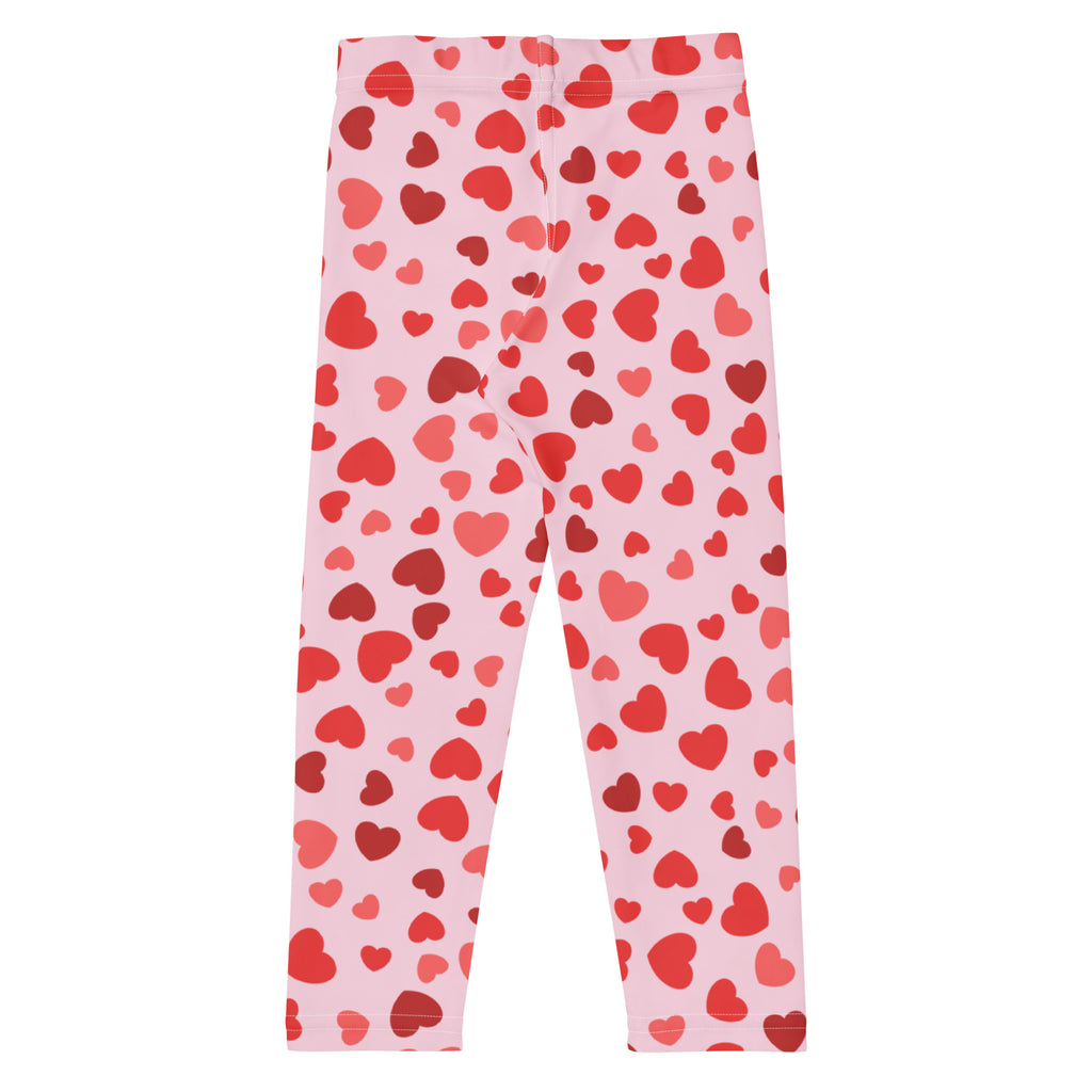 Girls valentine’s day pink heart buttery soft leggings with playful red and darker red heart pattern