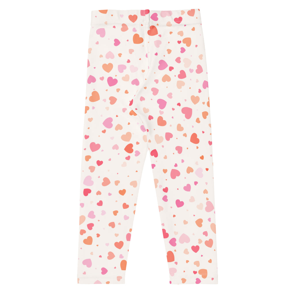 Girls pastel heart buttery soft white leggings with playful pink and orange heart pattern for comfortable wear