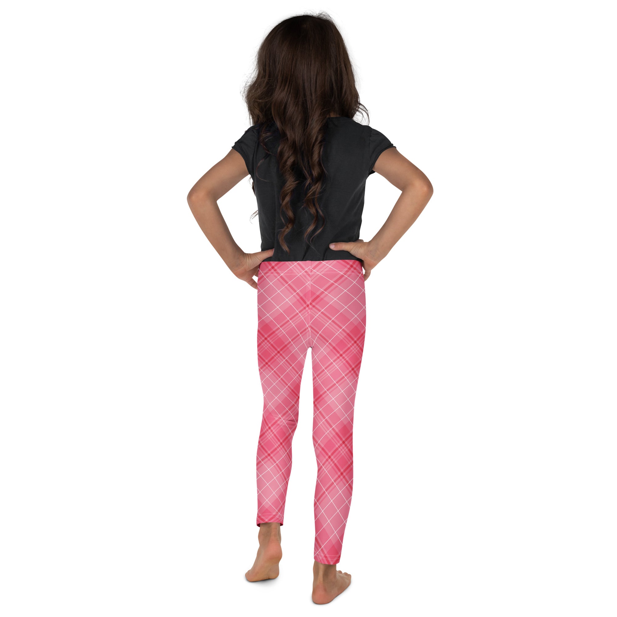 Girls pink plaid buttery soft leggings featuring a gradient pink pattern with white intersecting lines