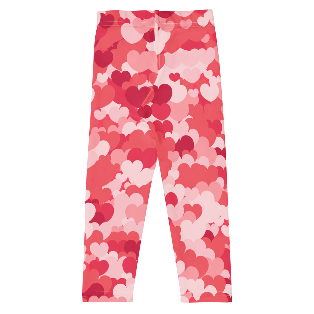 Girls pink heart cloud leggings featuring buttery soft, stretchy fabric with a heart pattern on a pink background