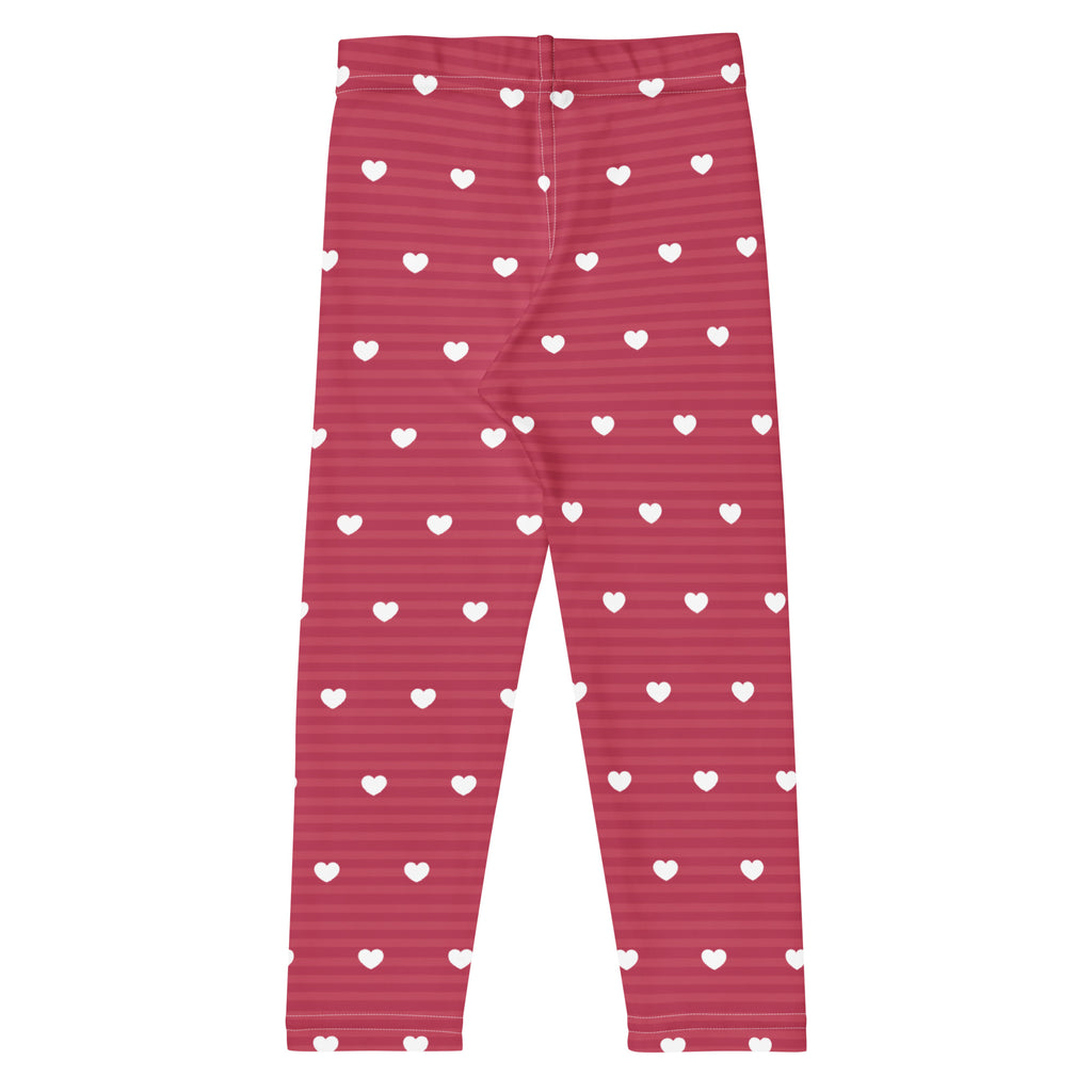 Girls pink buttery soft leggings with white heart patterns and subtle horizontal stripes for everyday wear