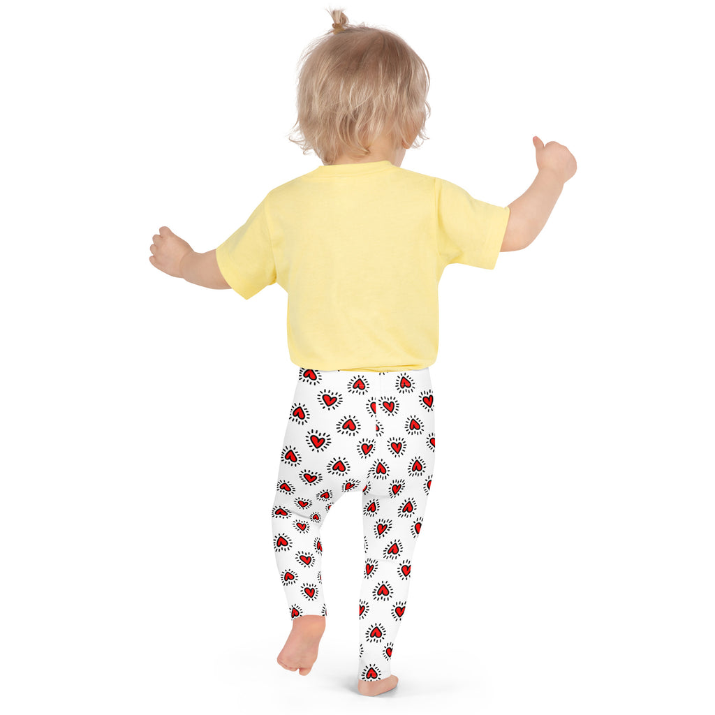 Girls Valentine’s Day white leggings with red hearts and black radiating lines buttery soft fabric