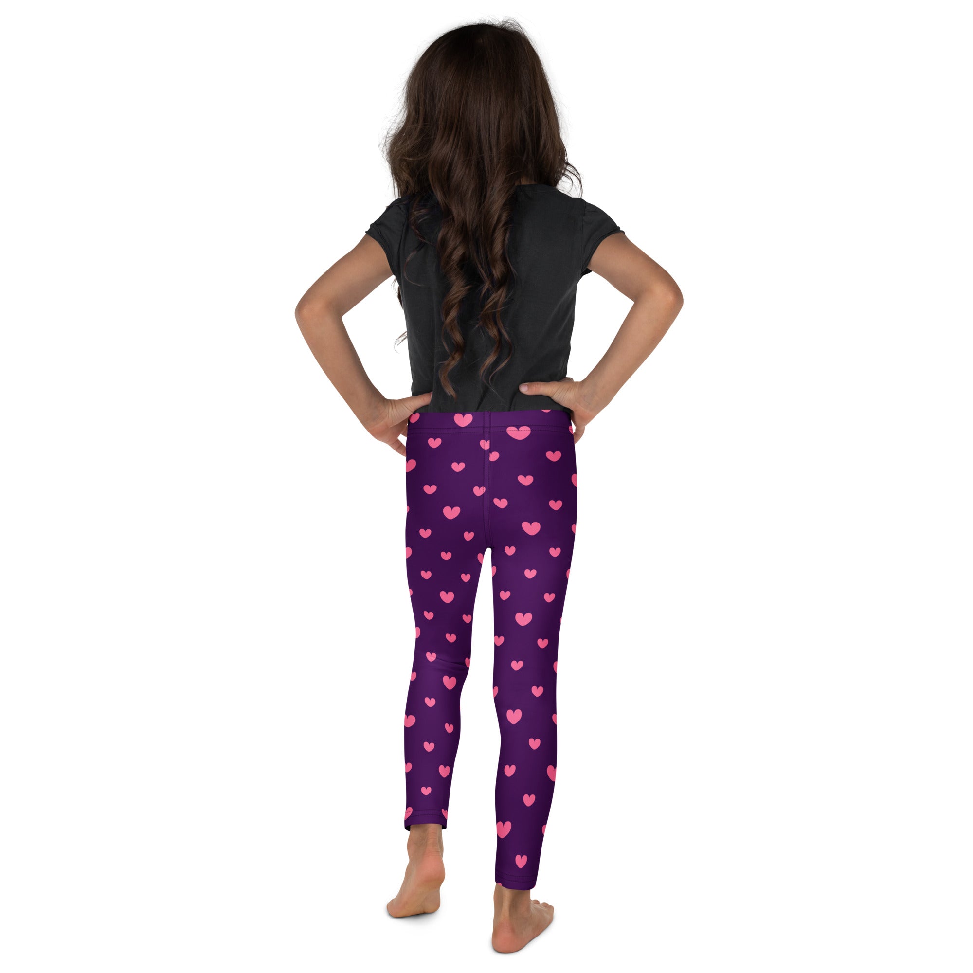 Girls purple heart leggings featuring a pink heart pattern made from buttery soft fabric