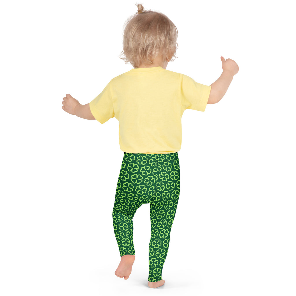 Girls dark green buttery soft leggings with a repeating light green four leaf clover shamrock pattern