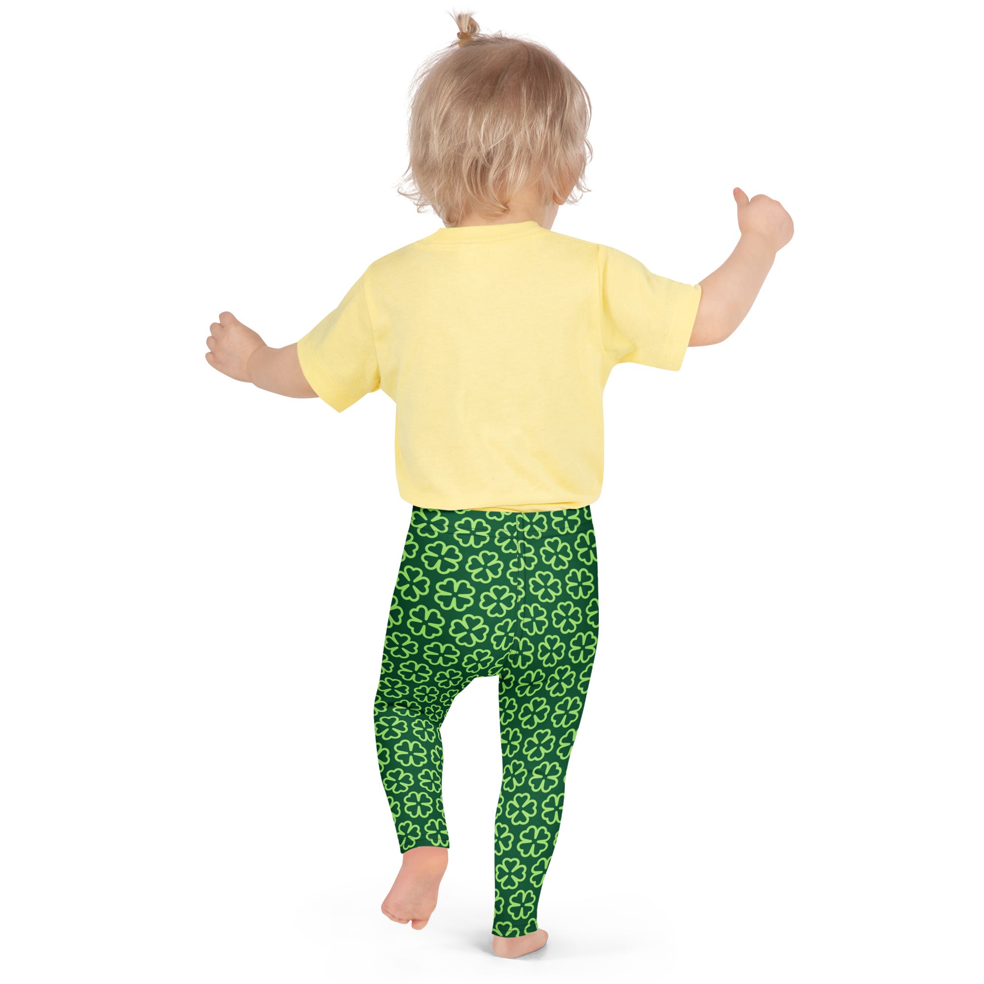 Girls dark green buttery soft leggings with a repeating light green four leaf clover shamrock pattern