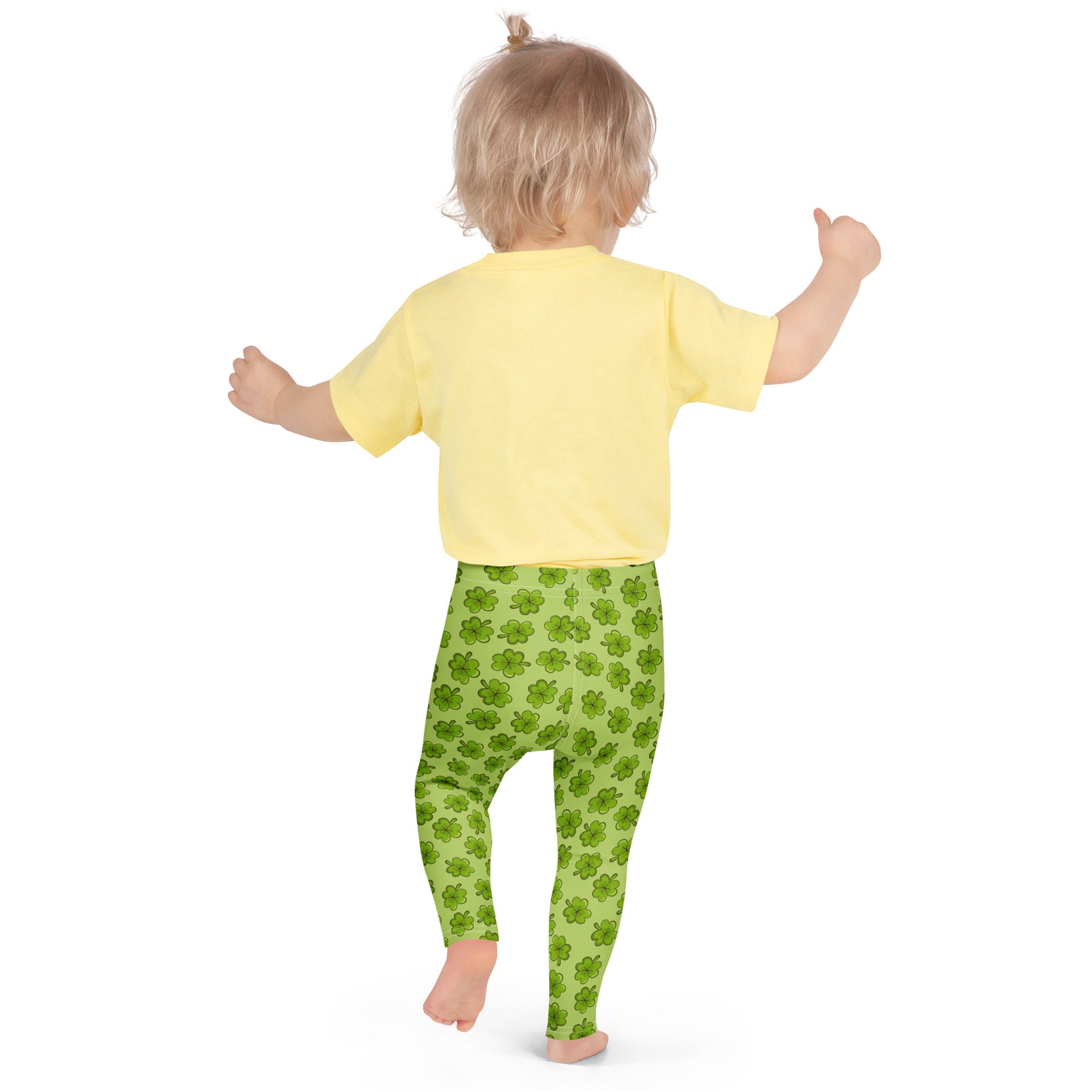 Girls lime green shamrock buttery soft leggings with bright green fabric and repeating shamrock pattern