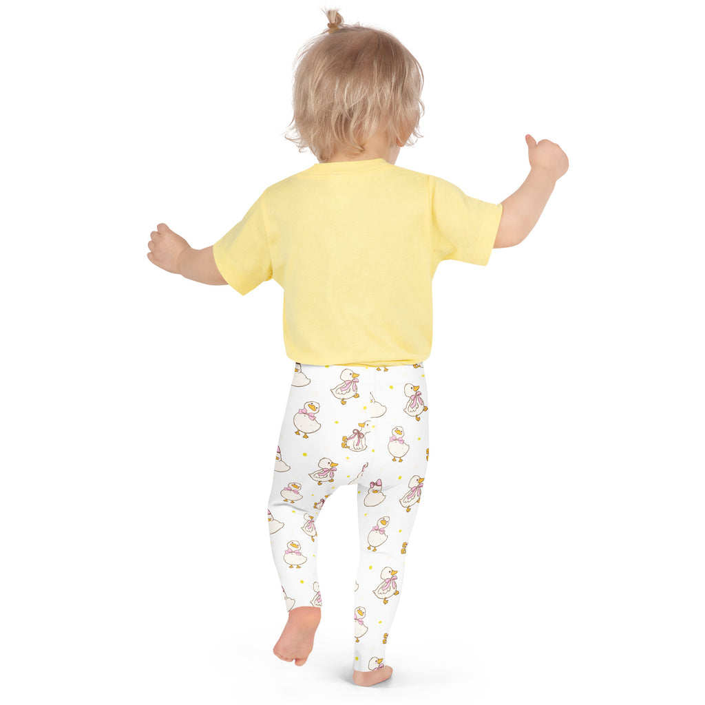Yellow short-sleeved top with soft comfortable fabric and round neckline paired with girls easter duck buttery soft leggings