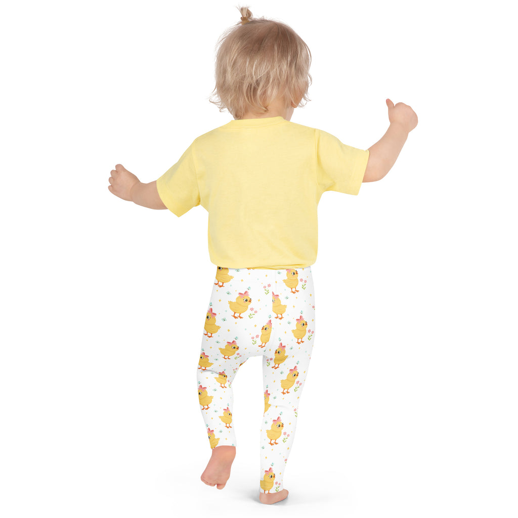 Yellow short-sleeved top with soft comfortable fabric and round neckline paired with girls cute chick buttery soft leggings