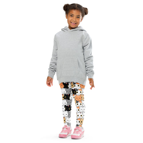 Child wearing gray hoodie and cat print kids leggings with colorful cartoon kittens