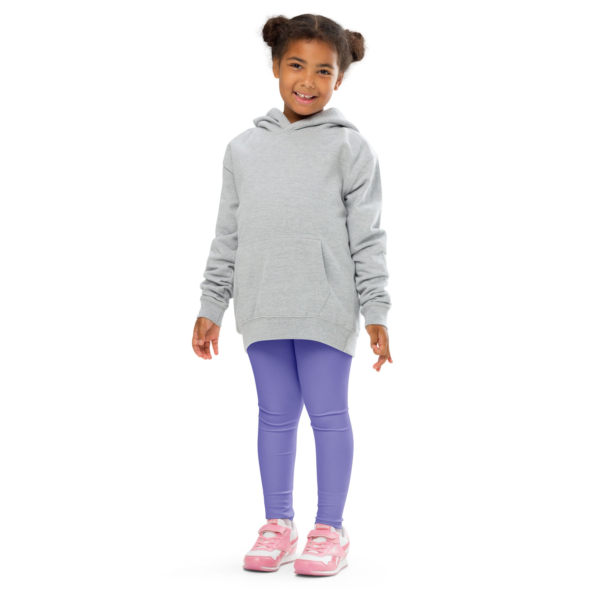 A child wearing girls buttery soft purple leggings paired with a light gray hooded sweatshirt with long sleeves