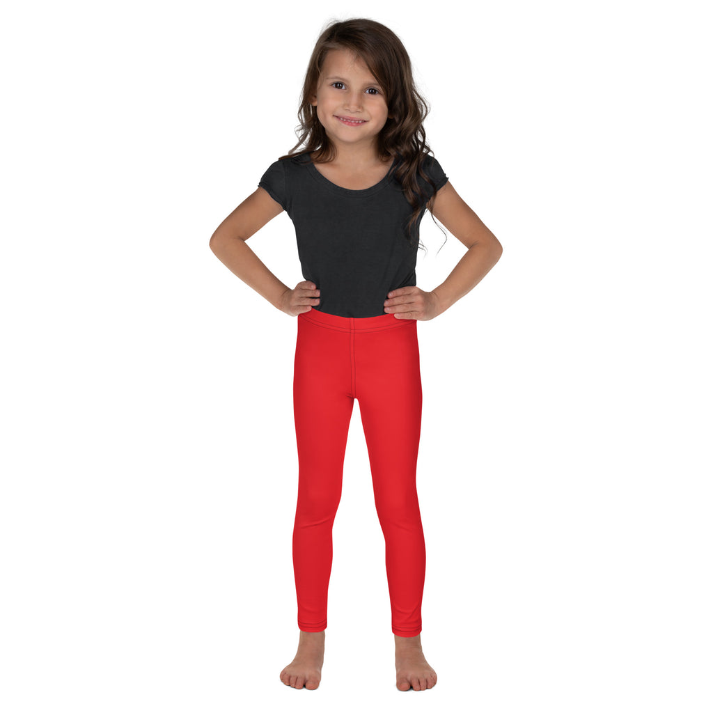 Bright red kids buttery soft leggings worn by a young girl showcasing form fitting comfortable design