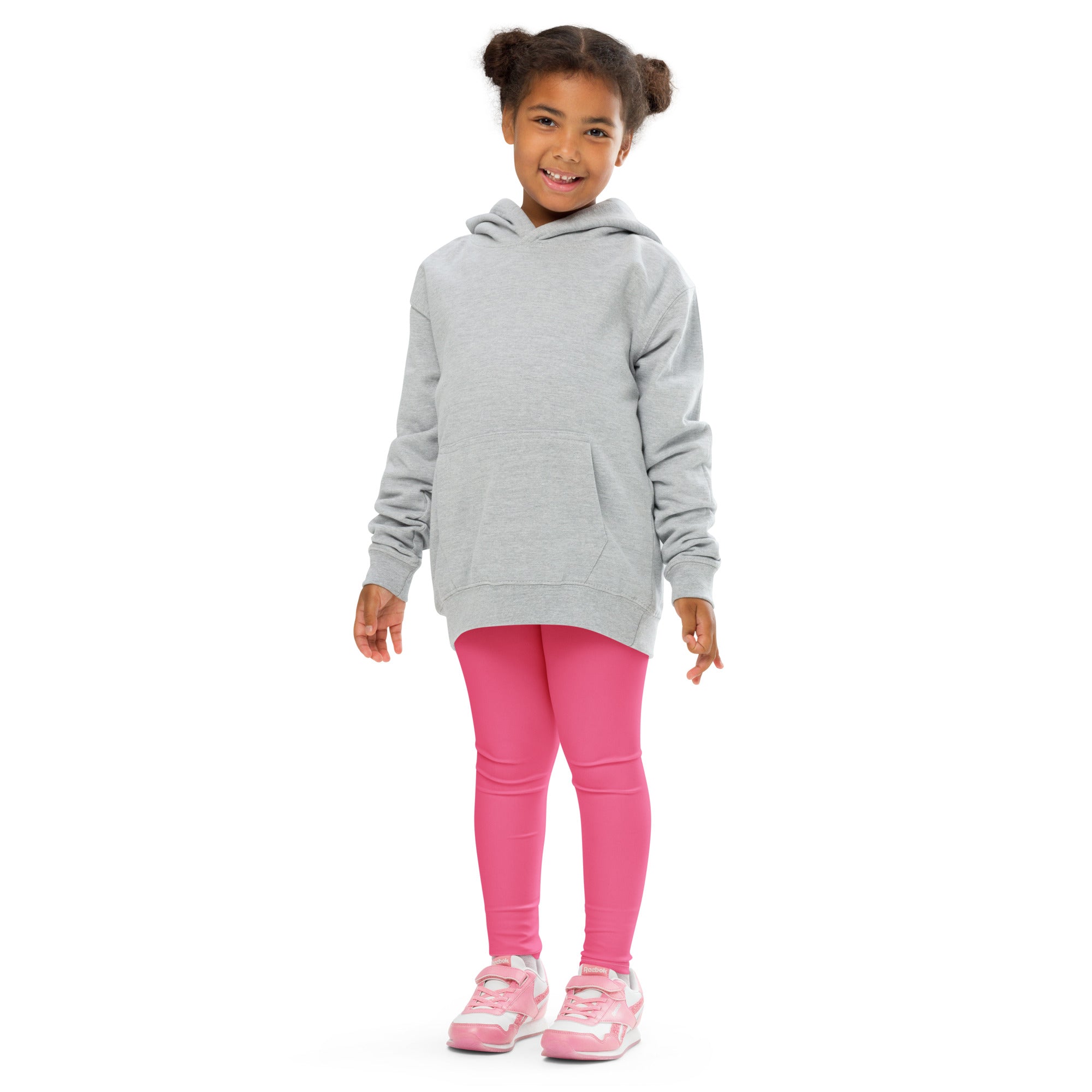 A child wearing girls buttery soft pink leggings paired with a light gray hooded sweatshirt with front pocket