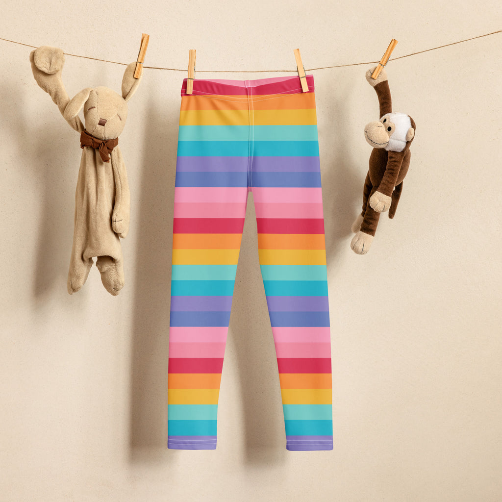 Girls bright rainbow striped buttery soft leggings with vibrant orange, yellow, blue, purple, and pink bands and a pink waistband