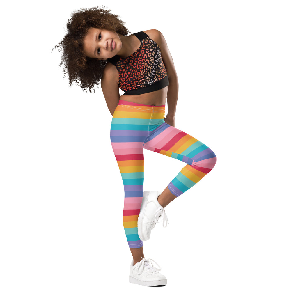Girls bright rainbow striped buttery soft leggings with stretchy form fitting design and vibrant horizontal bands