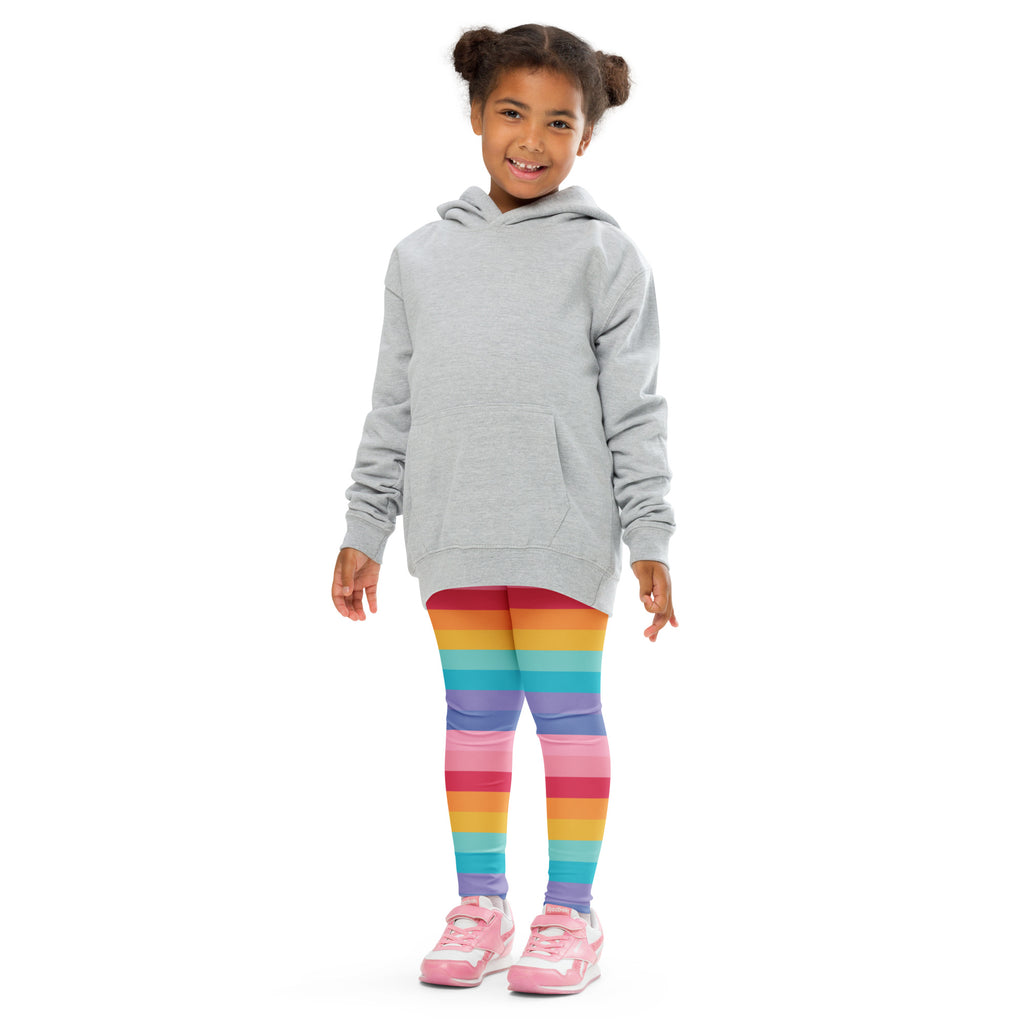 Gray hooded sweatshirt with front pocket and long sleeves paired with girls bright rainbow striped buttery soft leggings