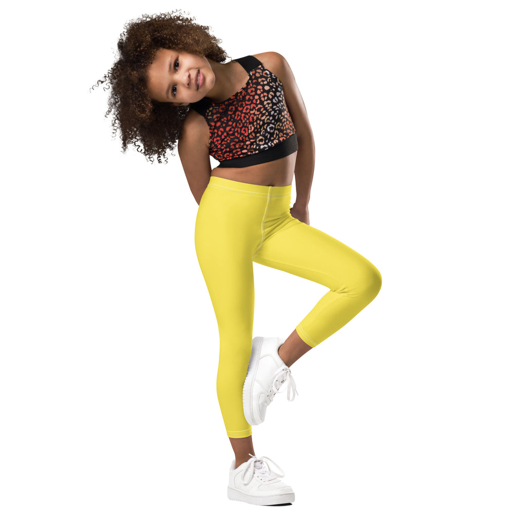 Bright yellow kids buttery soft leggings with high waist and smooth stretchy fabric for comfortable wear