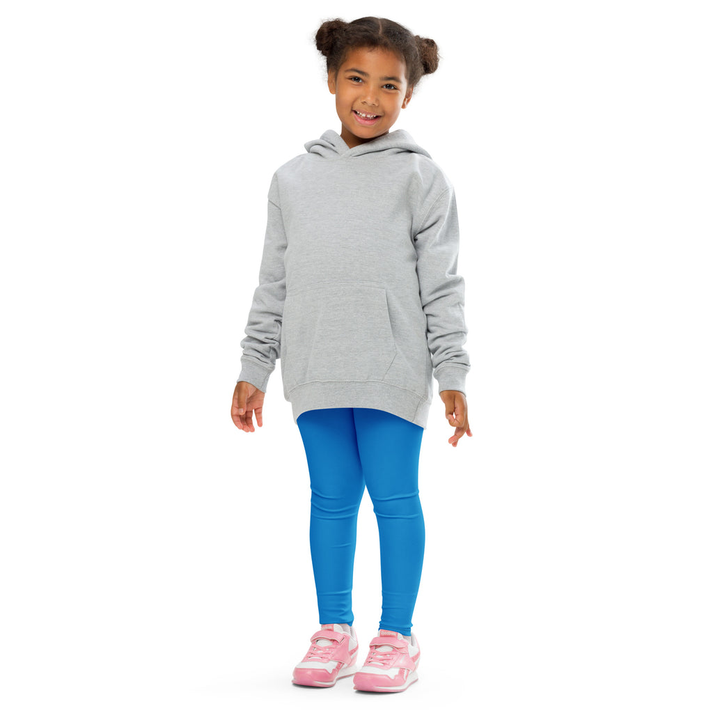 A child wearing a light gray hooded sweatshirt with long sleeves and kids buttery soft blue leggings
