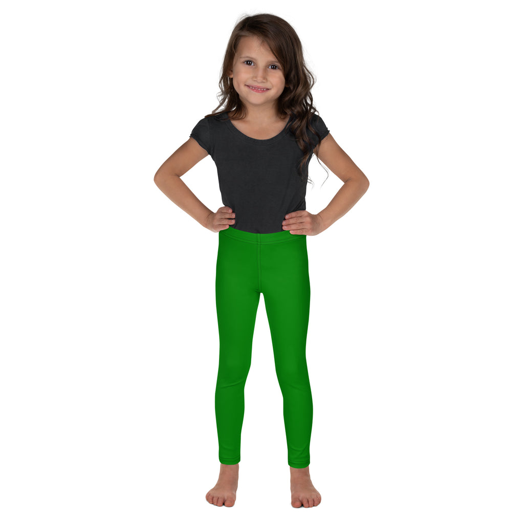 Bright green buttery soft kids leggings shown on a young girl with a form-fitting design