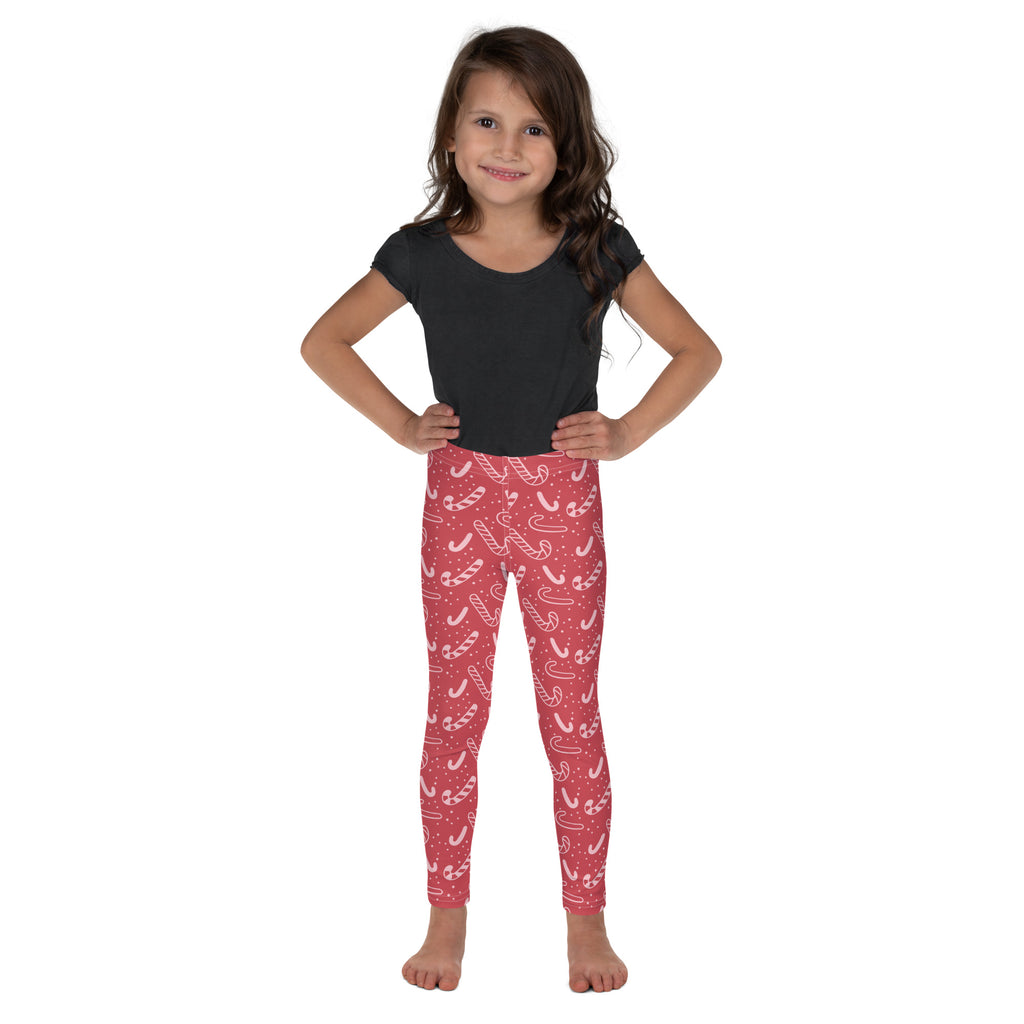Girls red buttery soft leggings with playful white candy cane and tiny dot pattern for festive wear
