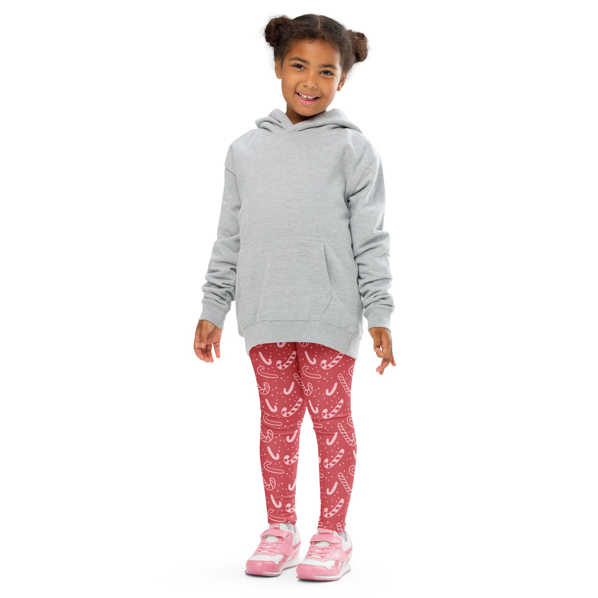Gray hooded sweatshirt with a front pocket and long sleeves shown with girls red candy cane buttery soft leggings