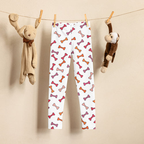 White girls dog bone leggings with multicolored pink orange and purple bones buttery soft stretchy for toddlers