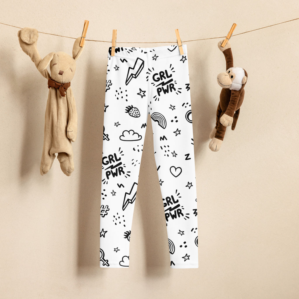 White buttery soft girl power kids leggings with playful black graphic print including grl pwr text and doodles