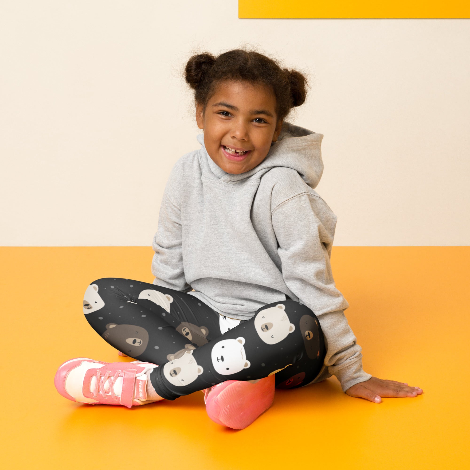 Black girls buttery soft leggings with playful white and gray bear face pattern for comfortable casual wear