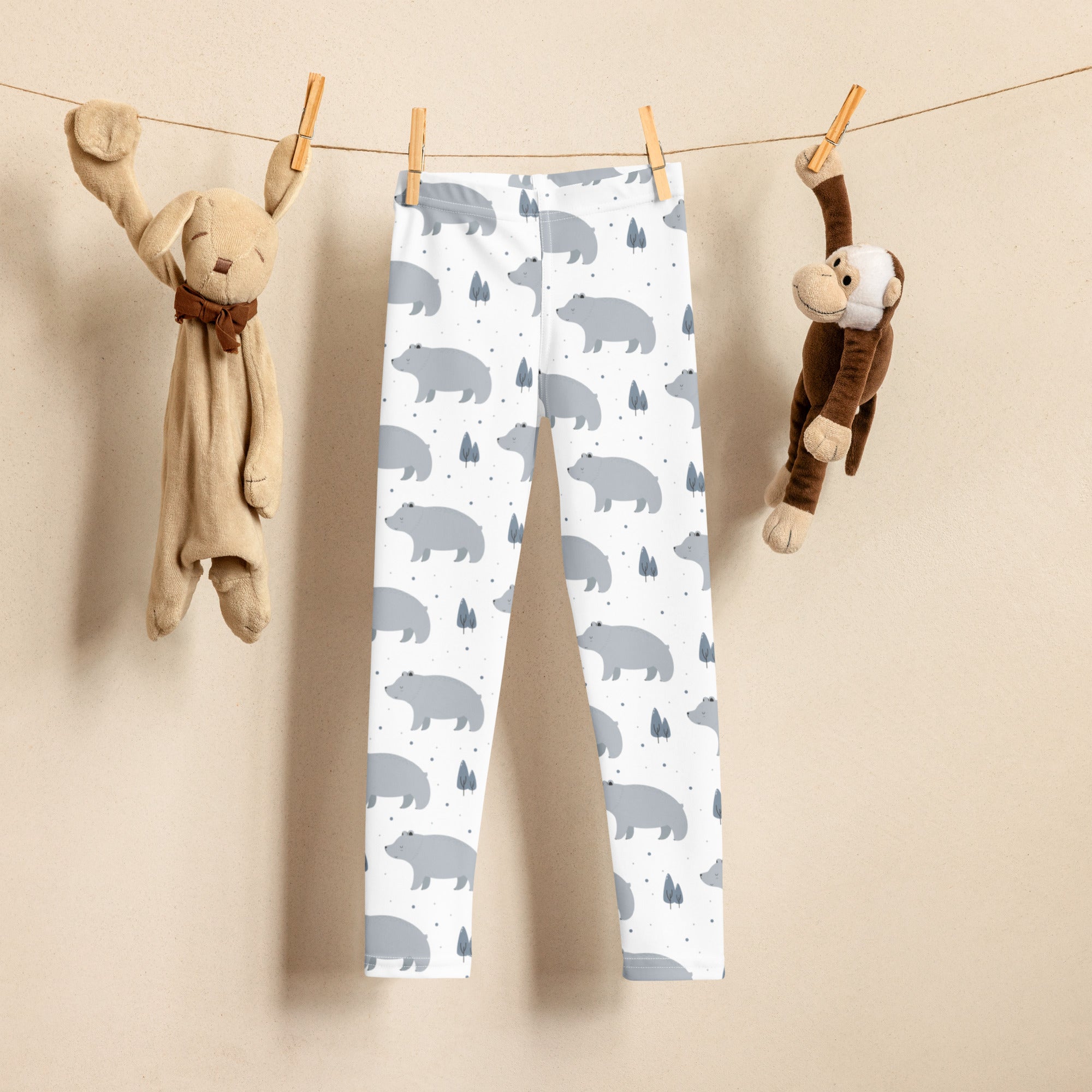Girls polar bear buttery soft white leggings with playful gray bear and small tree pattern for everyday wear
