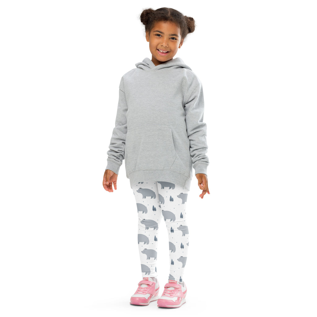 Girl wearing a gray hooded sweatshirt with front pocket and long sleeves paired with girls polar bear buttery soft leggings