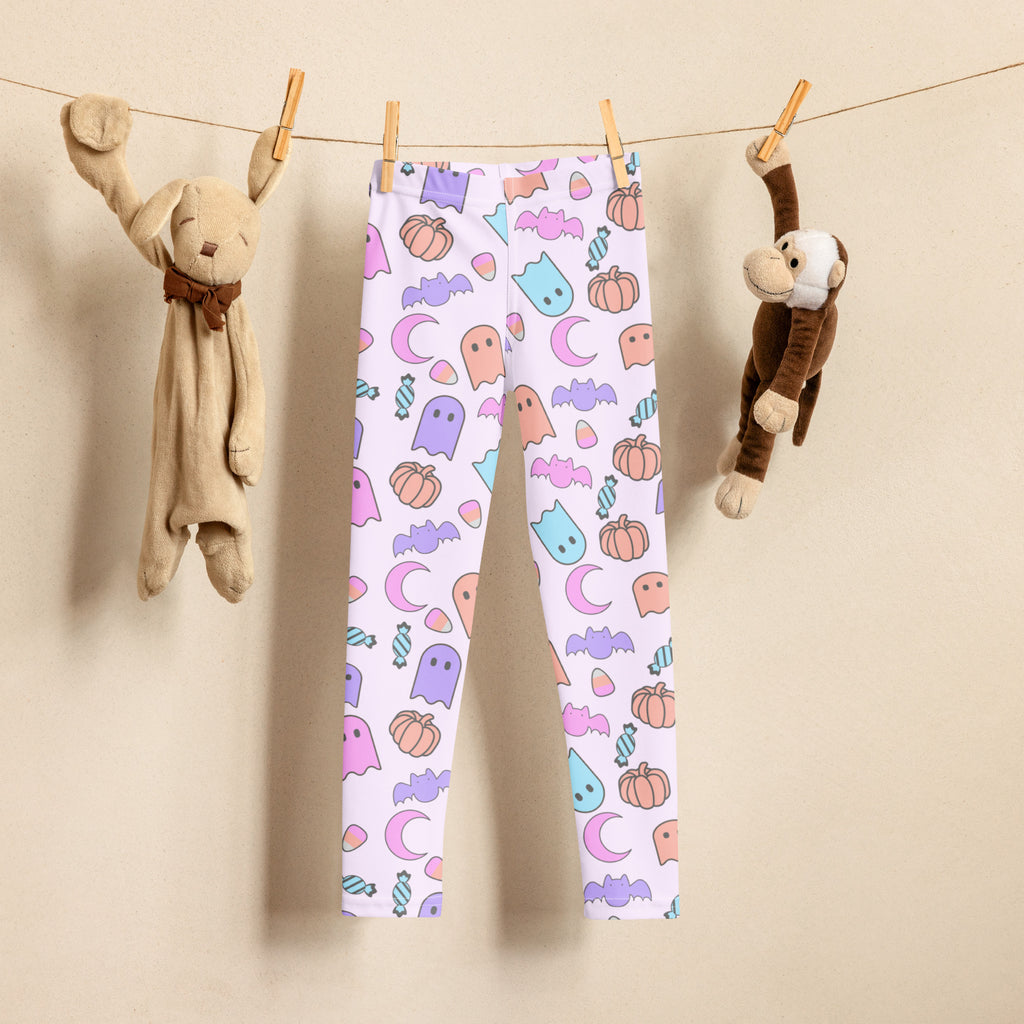 Girls halloween pattern buttery soft white leggings with pastel ghosts bats pumpkins and moons playful design