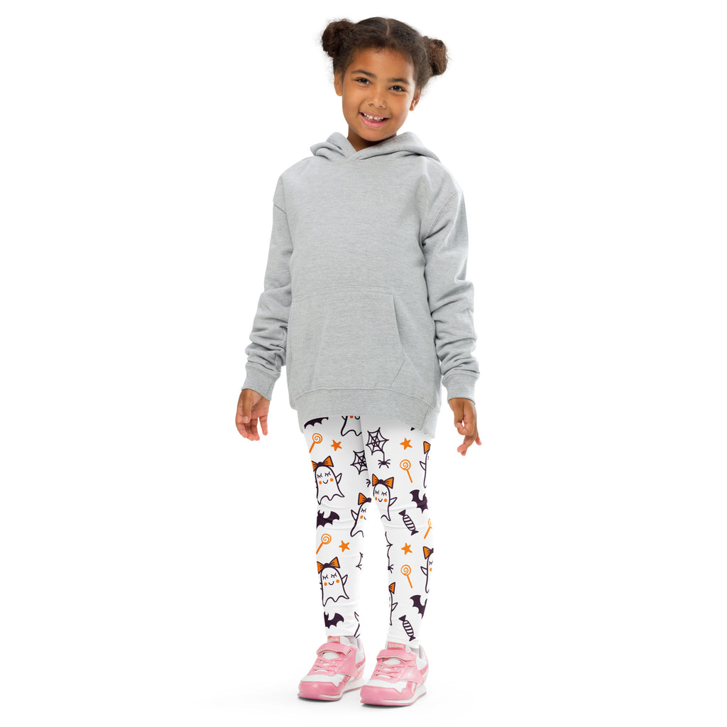 Girl wearing a gray hooded sweatshirt with long sleeves and front pocket paired with cute ghost bow buttery soft leggings