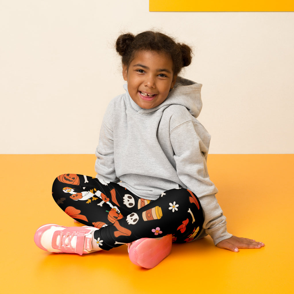 Kids goose halloween buttery soft black leggings with playful orange white and pink pumpkin skull and bone print