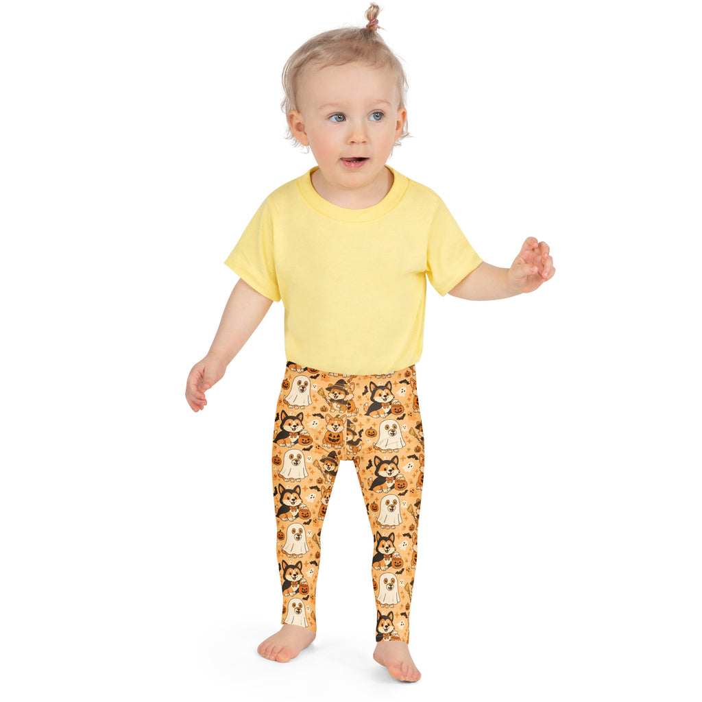 Yellow short-sleeved t-shirt paired with orange buttery soft kids corgi dog ghost halloween leggings with cartoon patterns