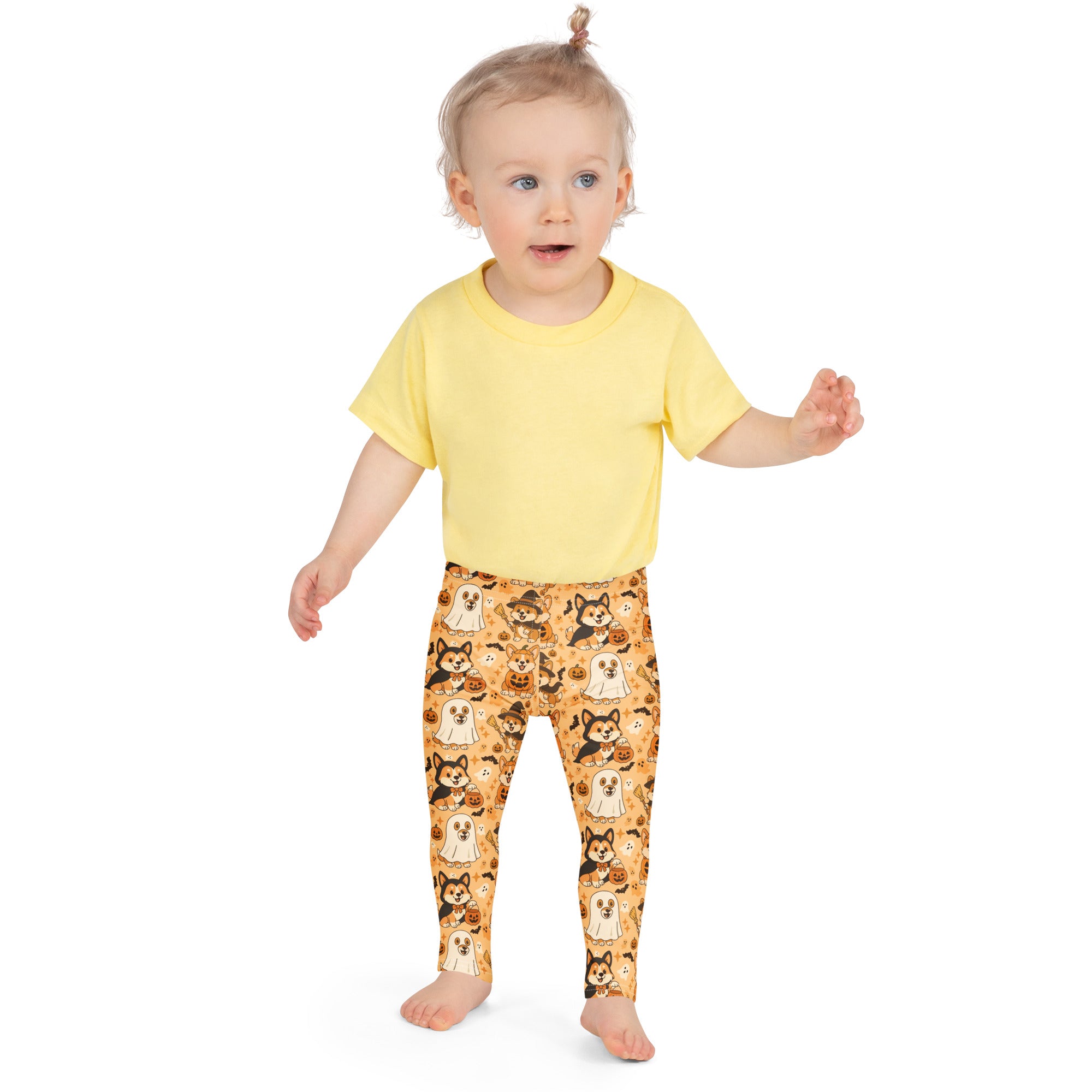 Yellow short-sleeved t-shirt paired with orange buttery soft kids corgi dog ghost halloween leggings with cartoon patterns