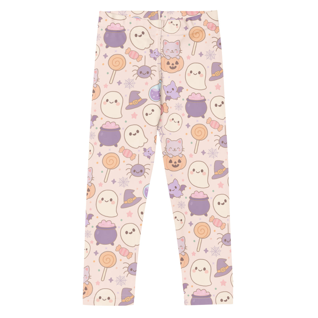 Pastel pink buttery soft girls leggings with halloween cats ghosts candy pattern for festive wear