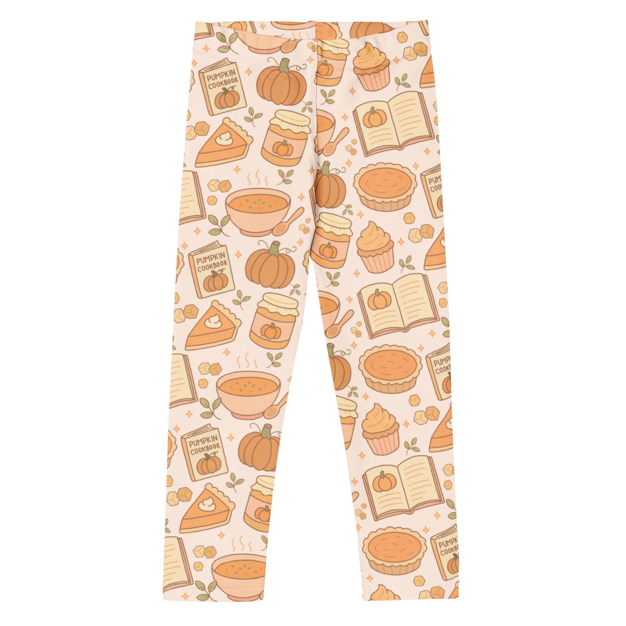 Cream-colored buttery soft kids leggings with playful autumn-themed pumpkin pie pattern including pumpkins pies and books