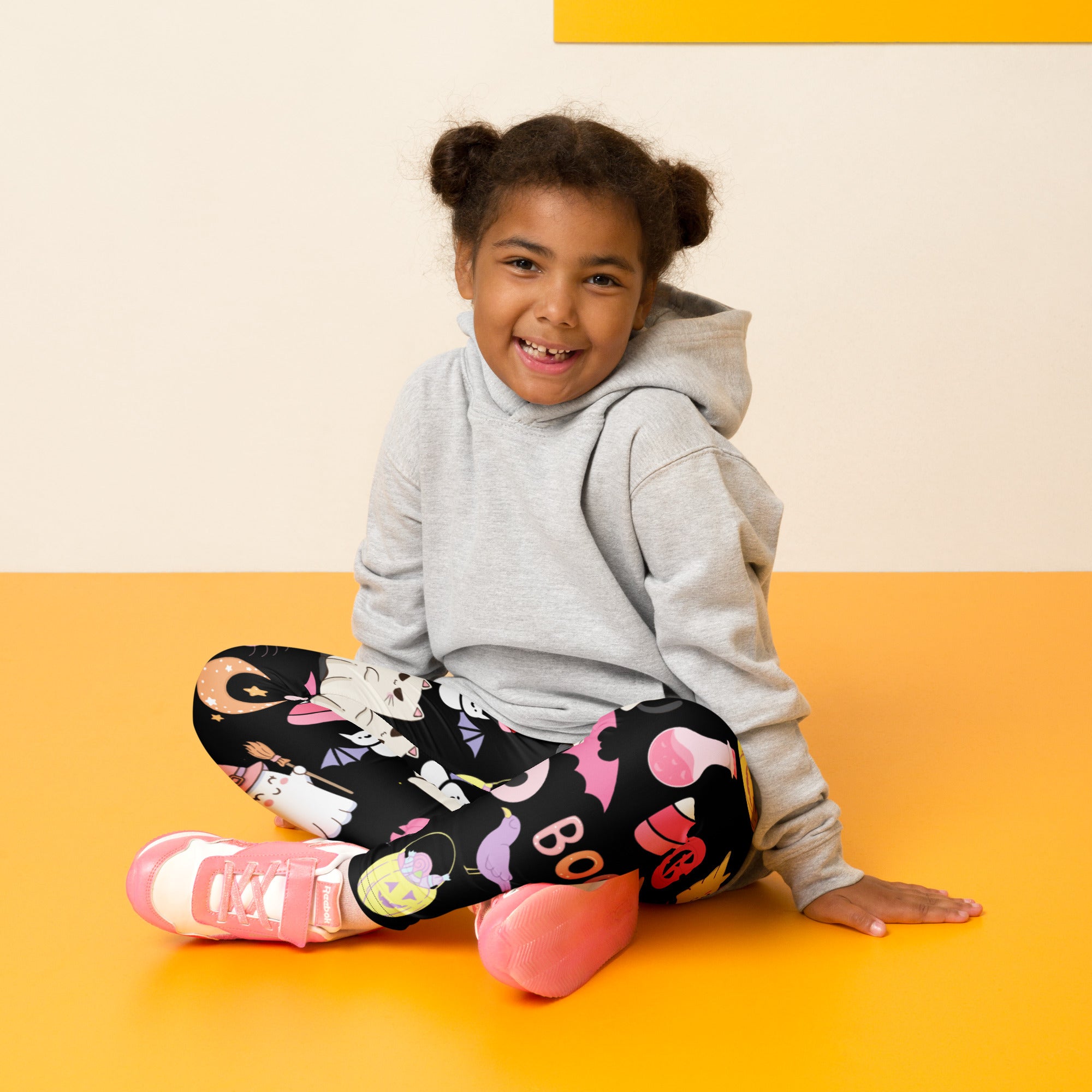 Black girls cute halloween buttery soft leggings with colorful cartoon print and pink purple yellow accents