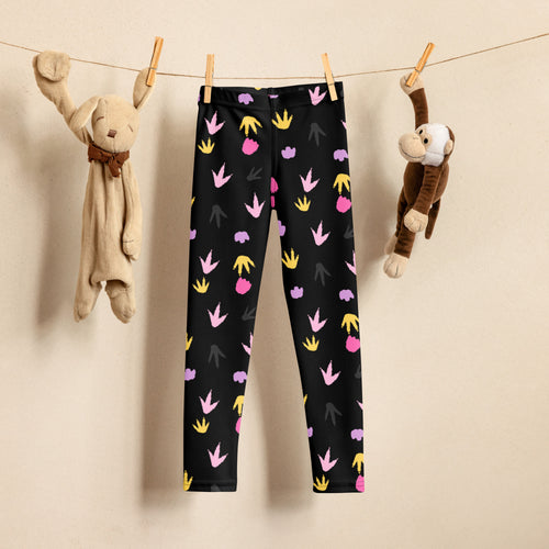 Girls dinosaur footprint buttery soft black leggings with pink yellow and purple playful dinosaur footprints pattern