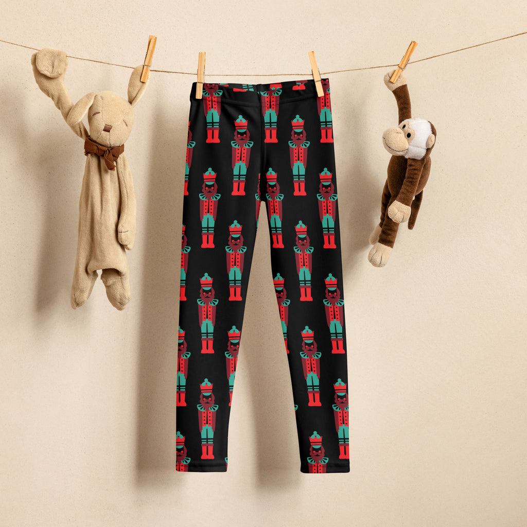 Girls nutcracker Christmas buttery soft black leggings with a repeating red and teal nutcracker soldier pattern