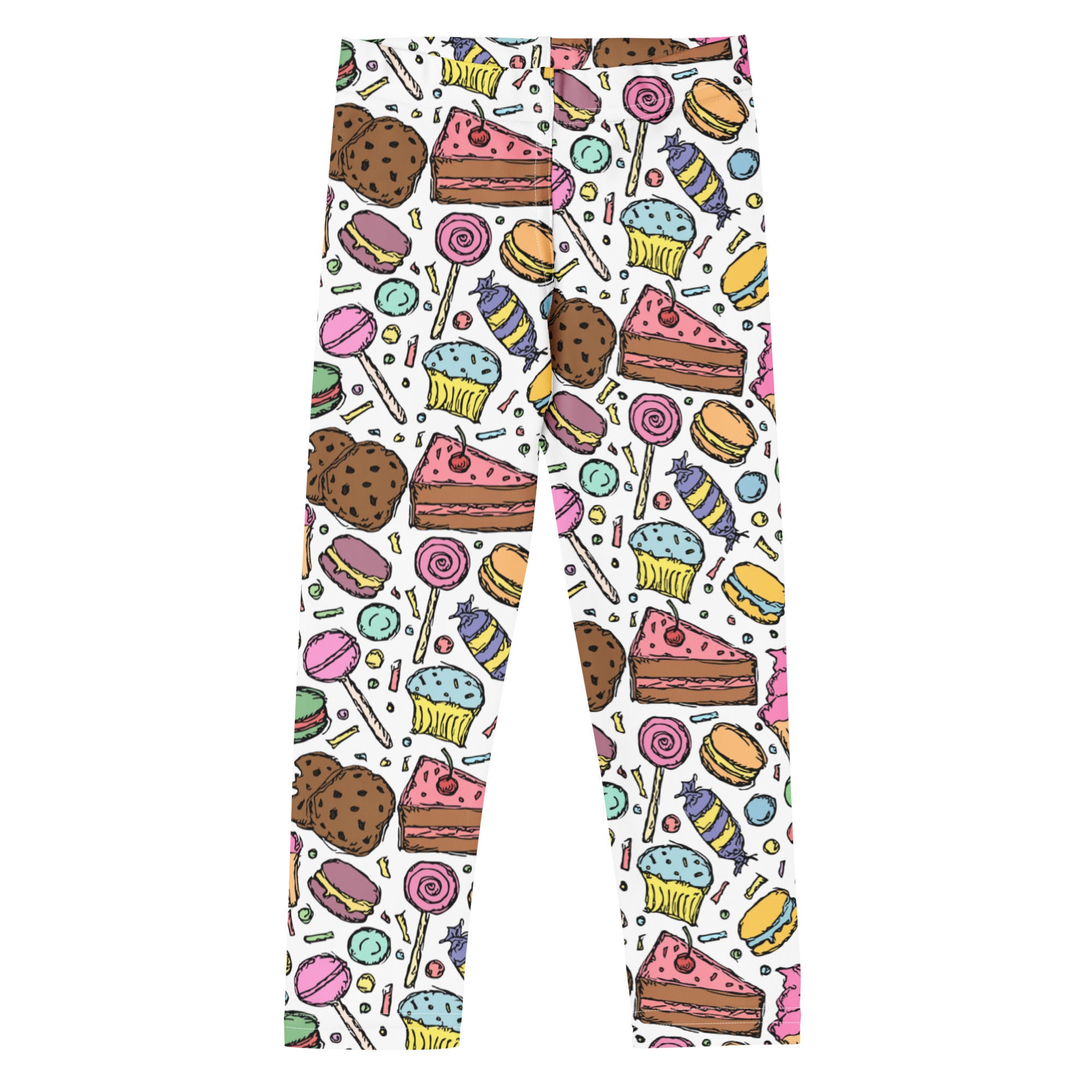 White buttery soft girls leggings with colorful cartoon cupcakes cookies and candies candy and dessert pattern