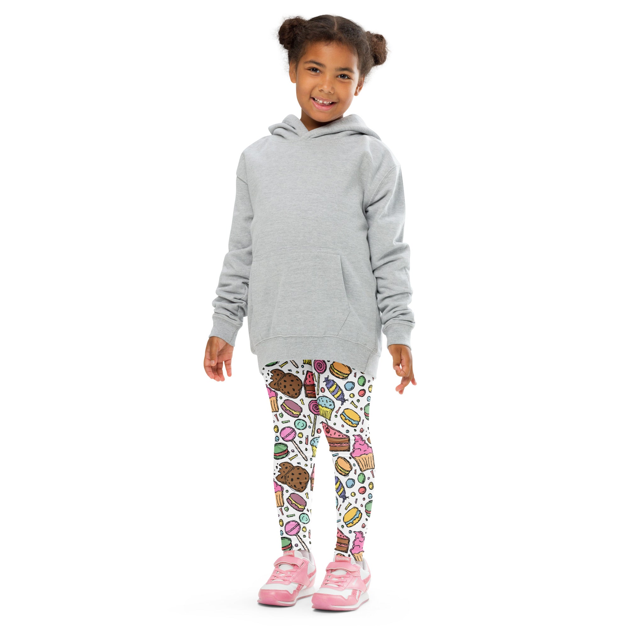 Girls candy and dessert buttery soft leggings with playful candy print paired with gray hoodie and pink sneakers