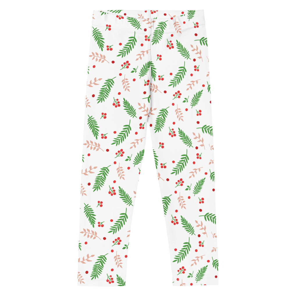 Kids holly and pine christmas buttery soft white leggings with green pine needles red berries and pink leaves festive pattern