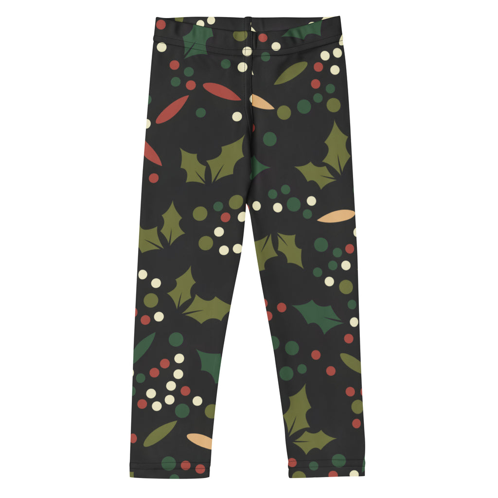 Kids holiday holly buttery soft leggings black with festive green holly leaves red and white berries pattern