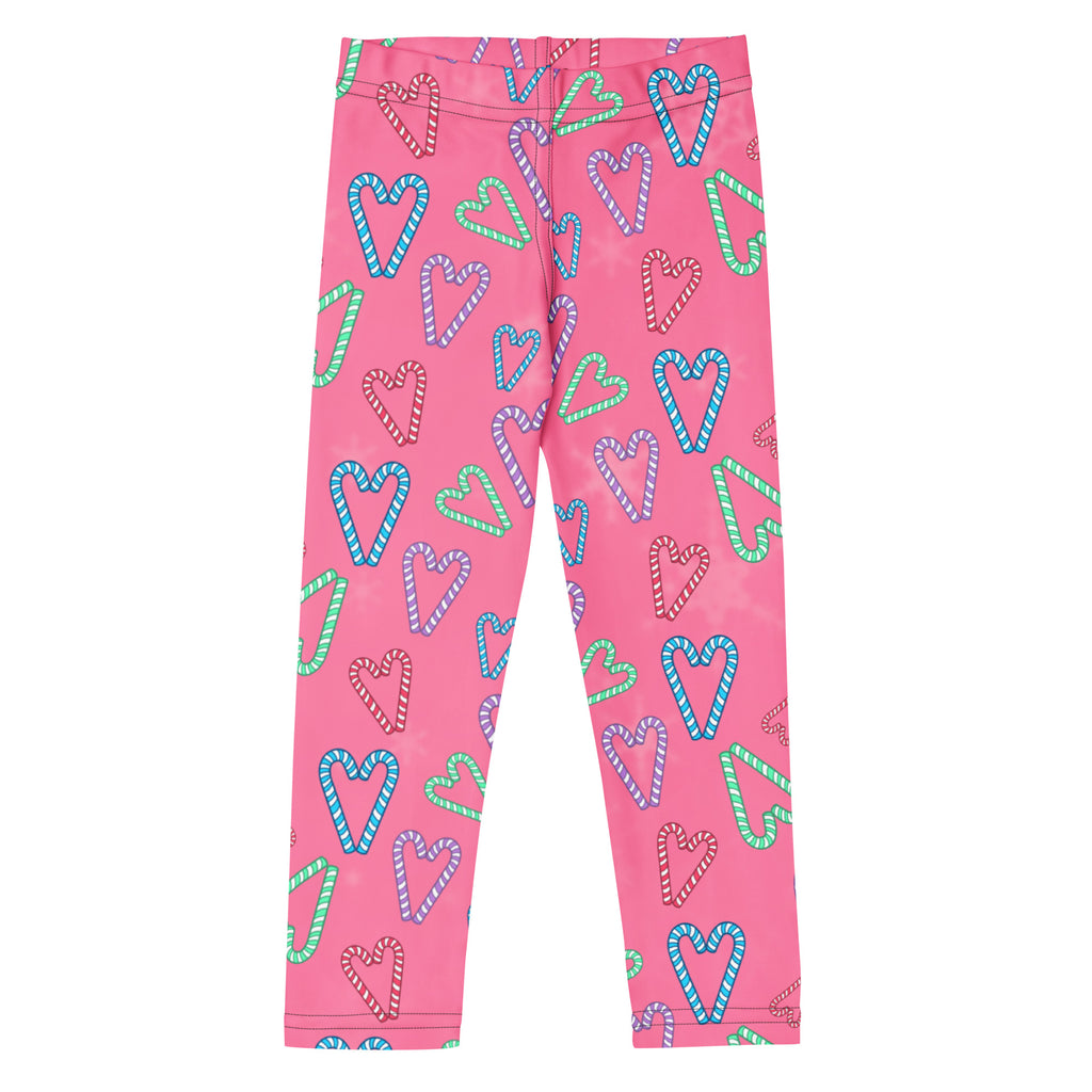 Girls pink buttery soft leggings with a playful pattern of blue green and purple candy cane shaped hearts