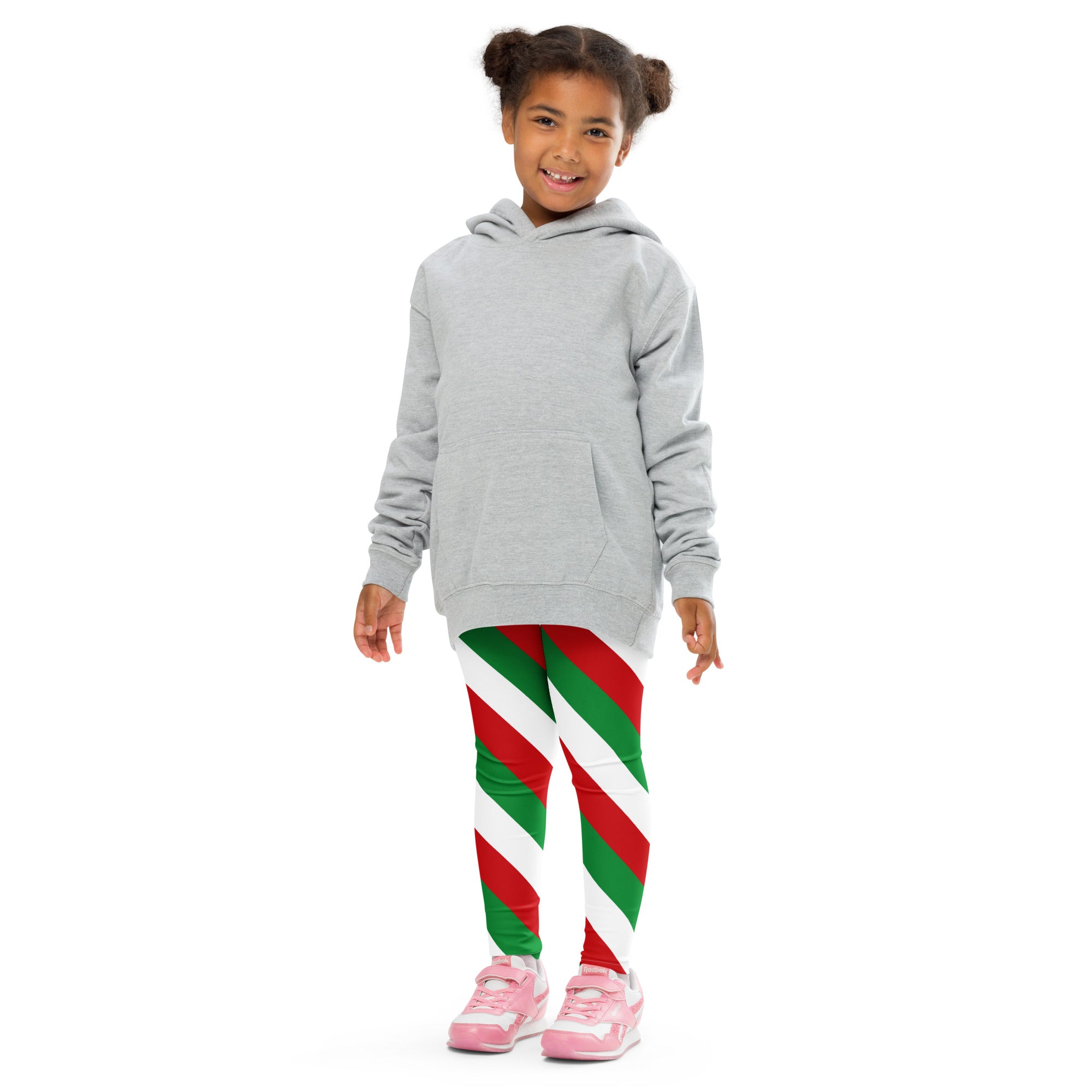 Gray hooded sweatshirt with front pocket and long sleeves paired with kids red green and white christmas leggings