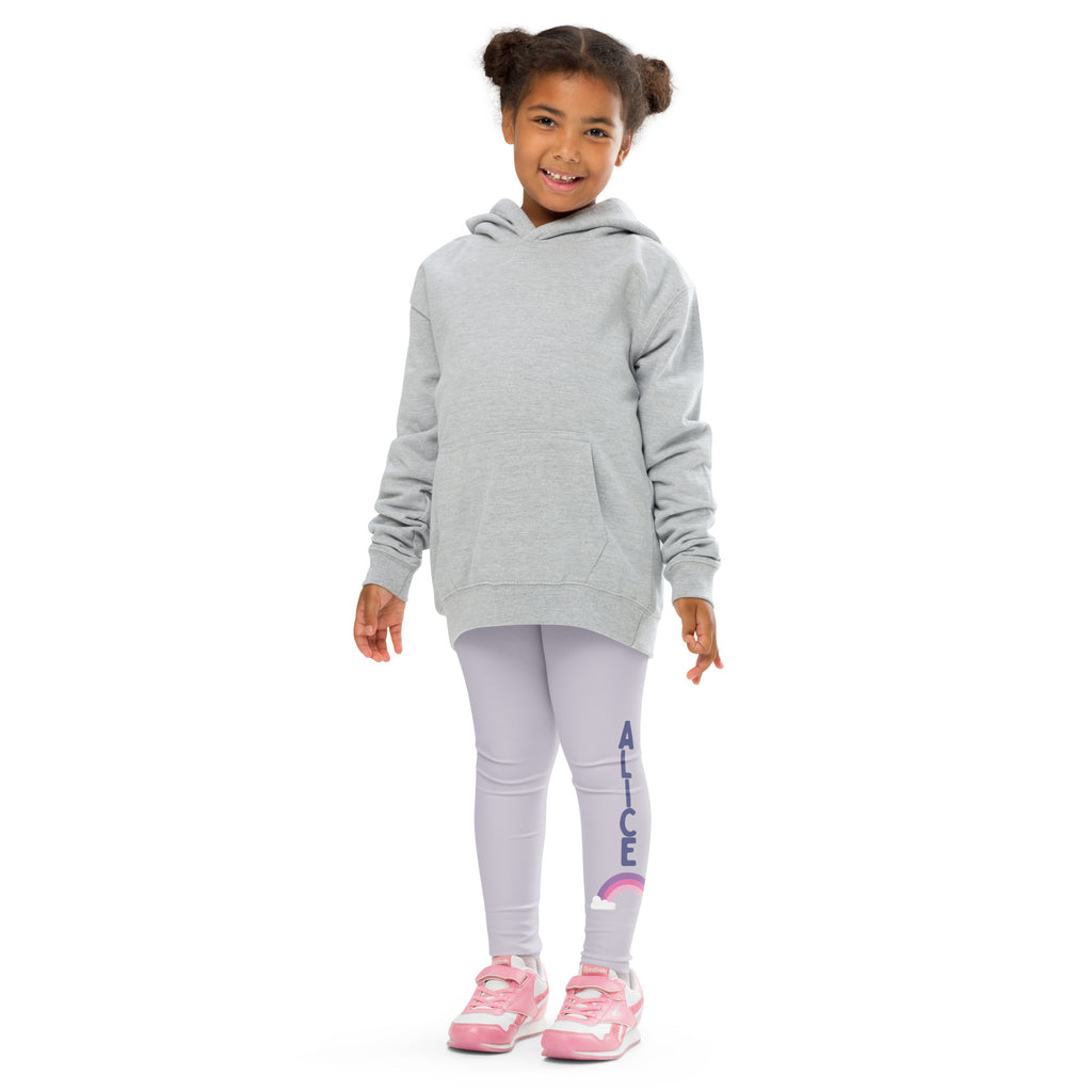 A child wearing girls custom name buttery soft lavender leggings with rainbow and a gray hooded sweatshirt