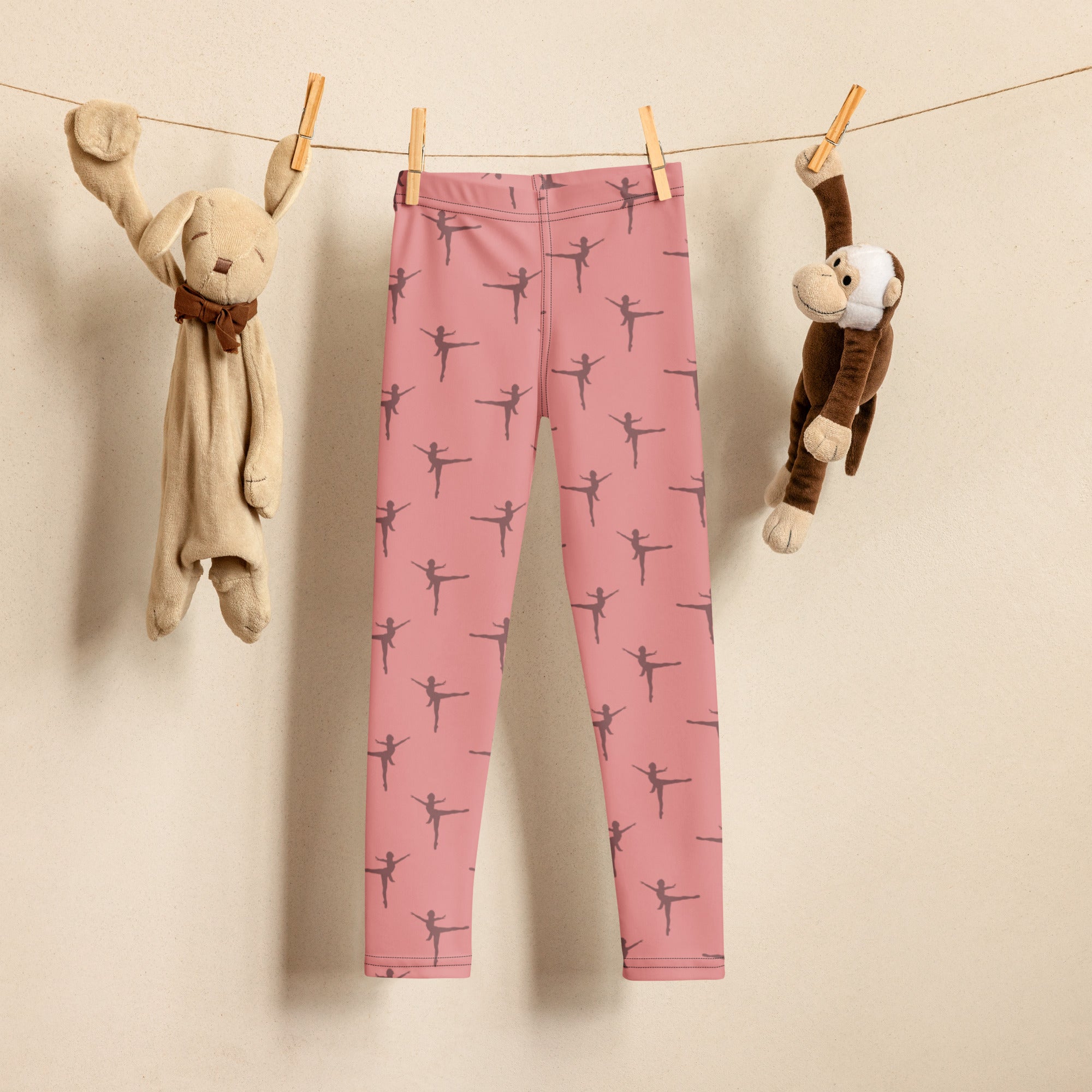 Girls pink dance buttery soft leggings in pink with dark gray ballet dancer silhouette pattern
