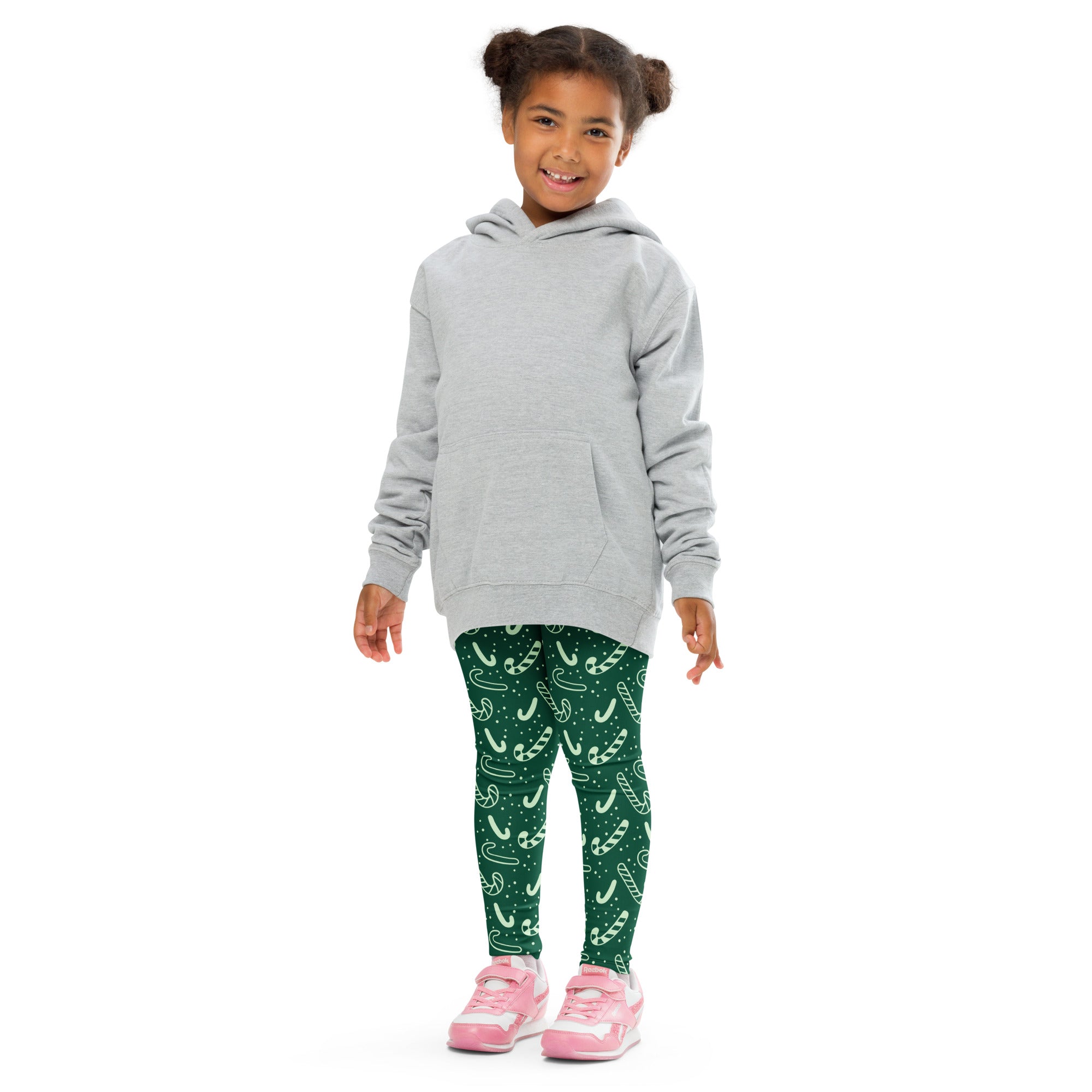 Gray hooded sweatshirt with front pocket and long sleeves paired with kids green candy cane buttery soft leggings
