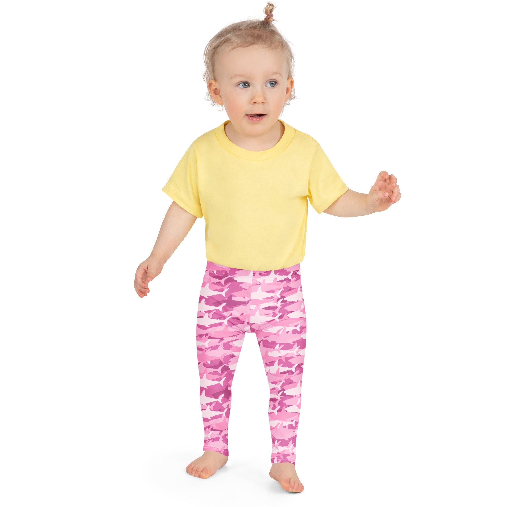 Girls pink buttery soft leggings with a playful shark design and pink camouflage pattern